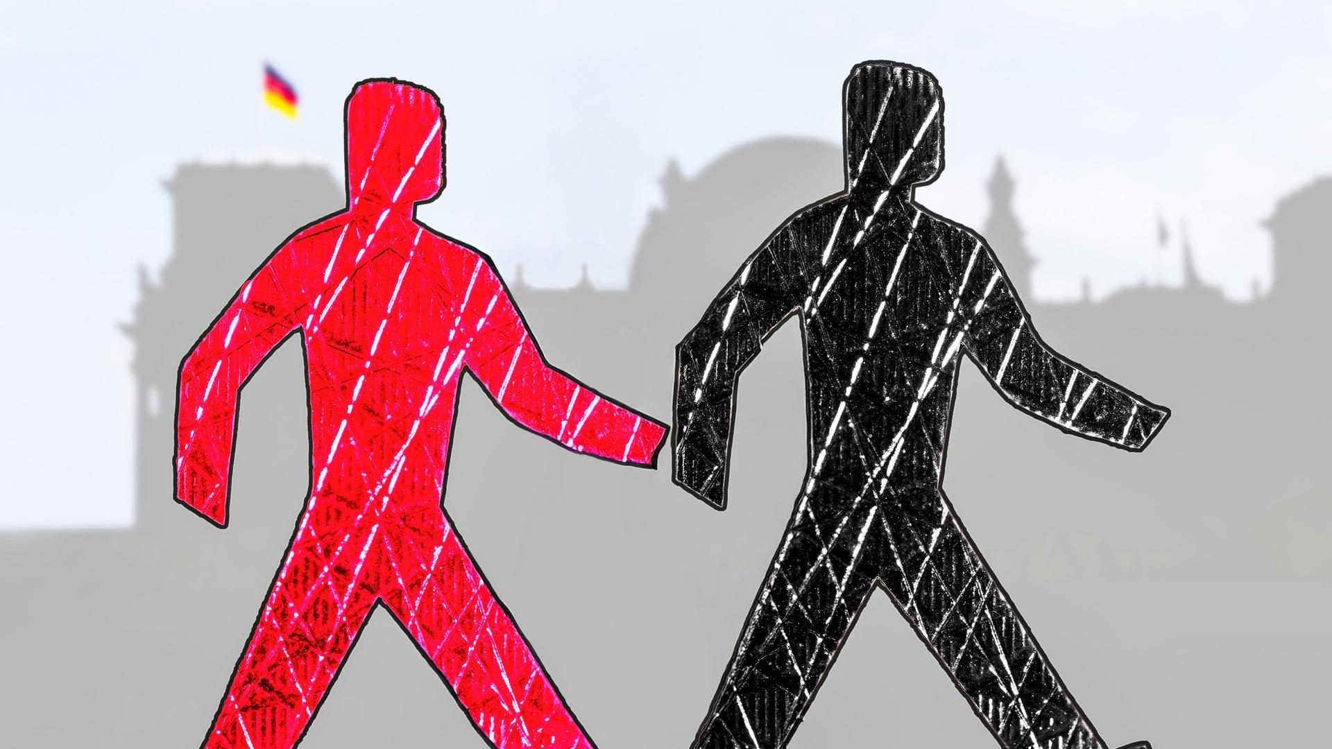 Schwarz-rote Ampelmännchen, Symbolfoto für eine Große Koalition aus CDU/CSU und SPD, vor der Silhouette des Reichstag