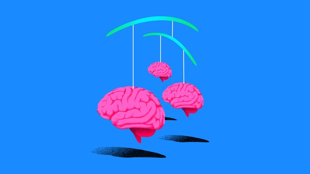 Die Illustration zeigt ein Mobile mit drei Gehirnen.