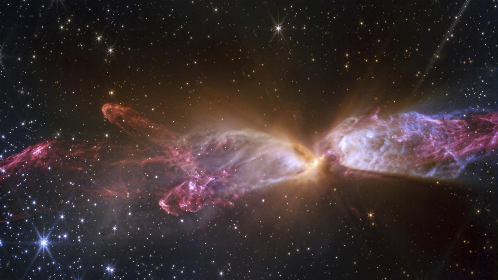 Das James-Webb-Weltraumteleskop sieht mit seinem Infrarot-Blick, dass in Lynds Dunklem Nebel Nr. 478 gerade einige Sterne entstehen und das Gas aufheizen. 