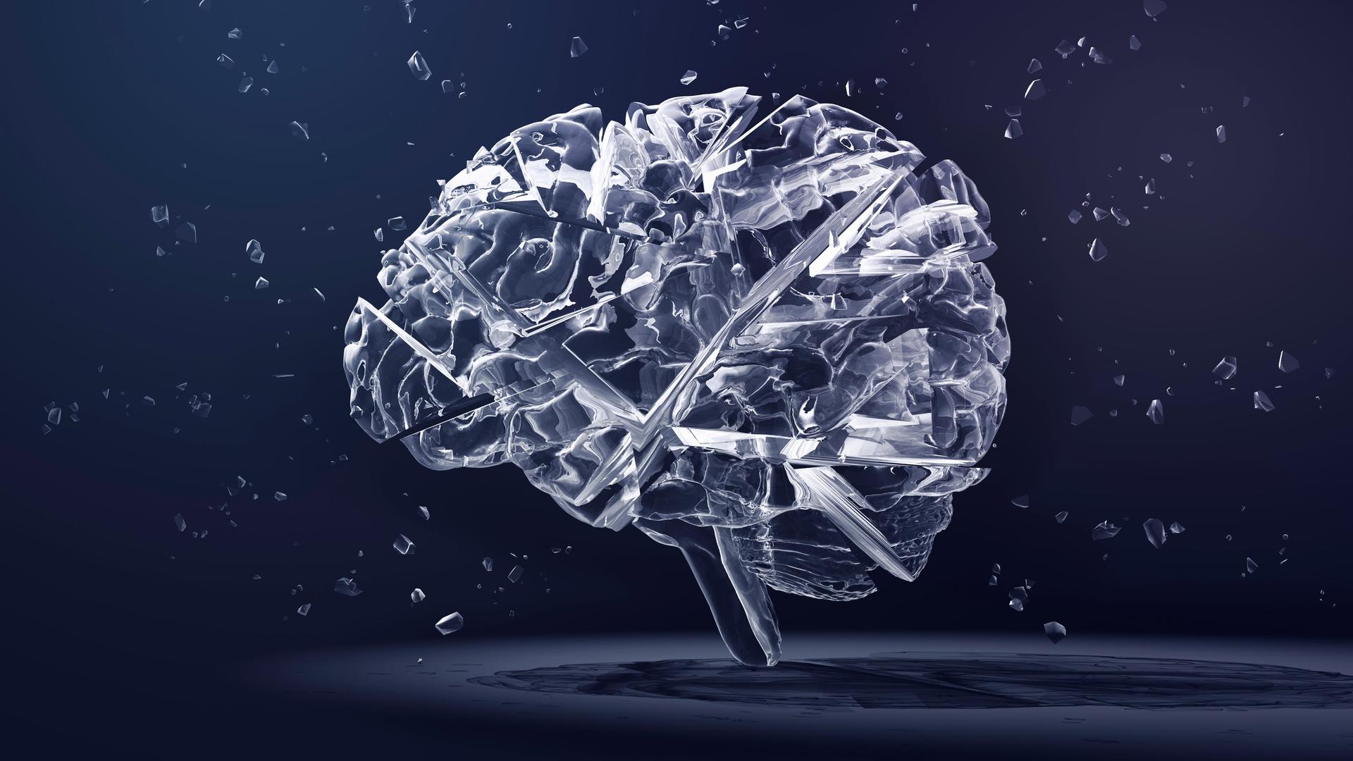 Digital gerenderte Abbildung eines gläsernen Gehirns, das zerspringt.