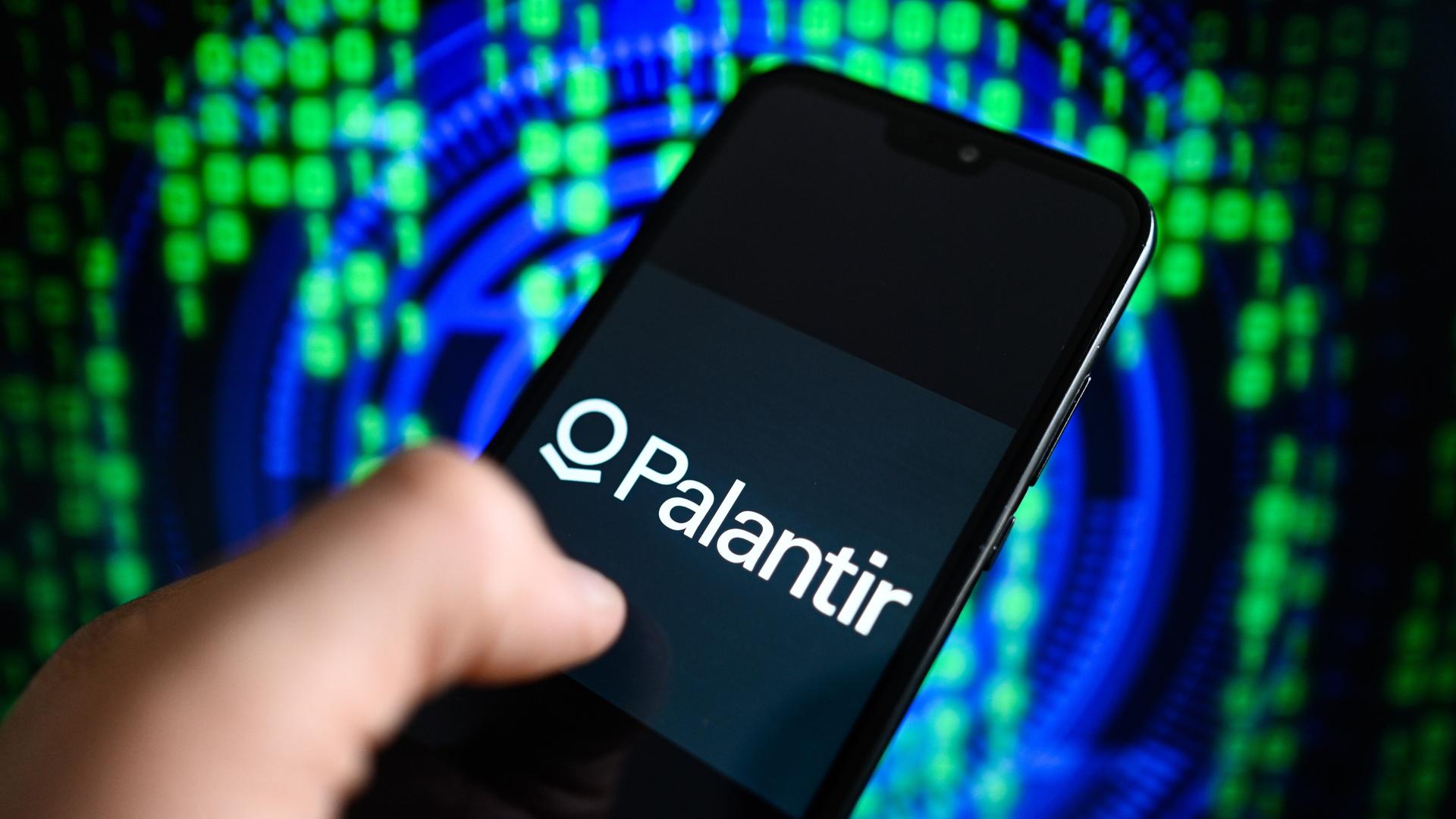 April 25, 2024, Poland: In this photo illustration the Palantir logo is displayed on a smartphone with coding on the background. (Credit Image: © Omar Marques/SOPA Images via ZUMA Press Wire