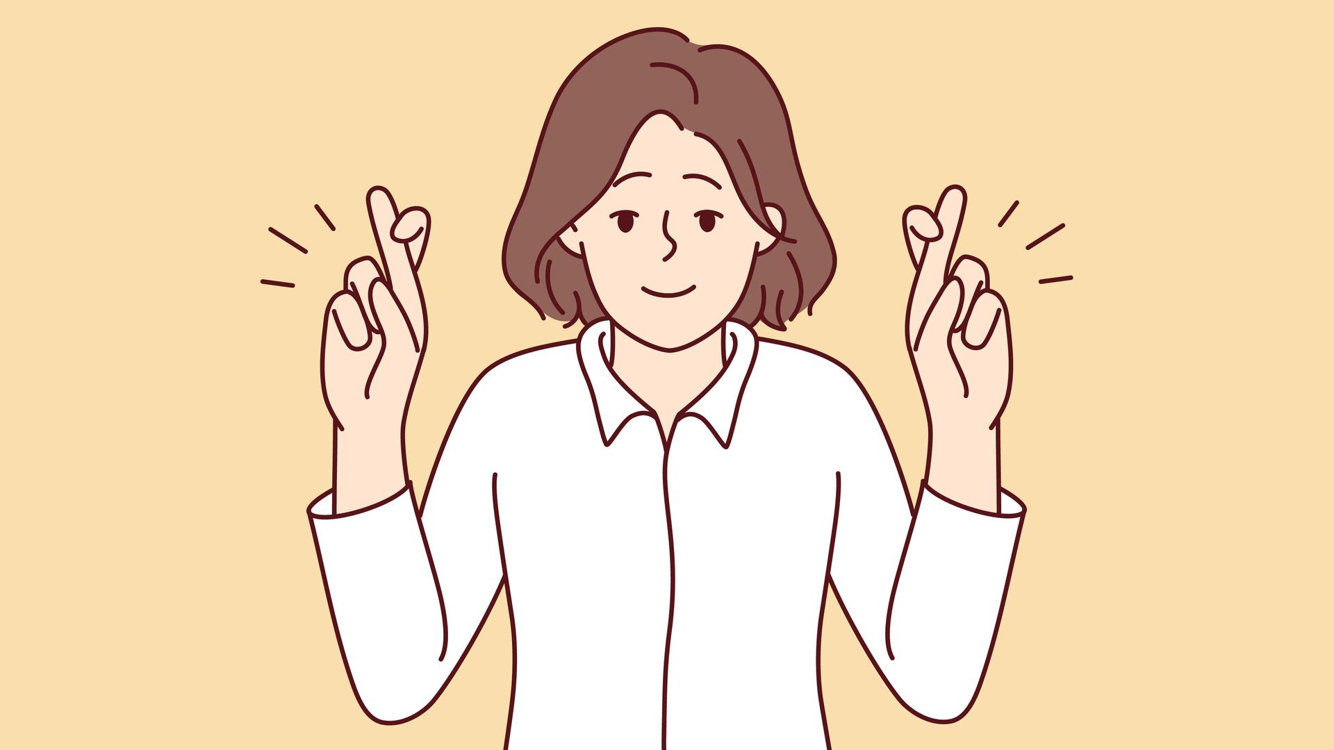 Lächelnde junge Frau drückt die Daumen